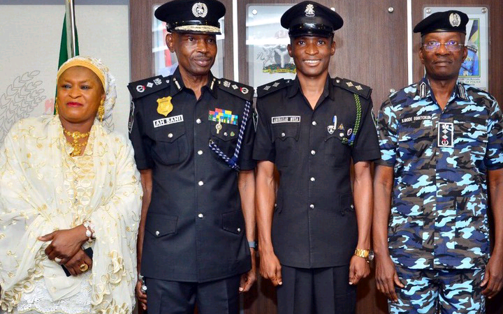 Father, son decorated same day with new Police ranks