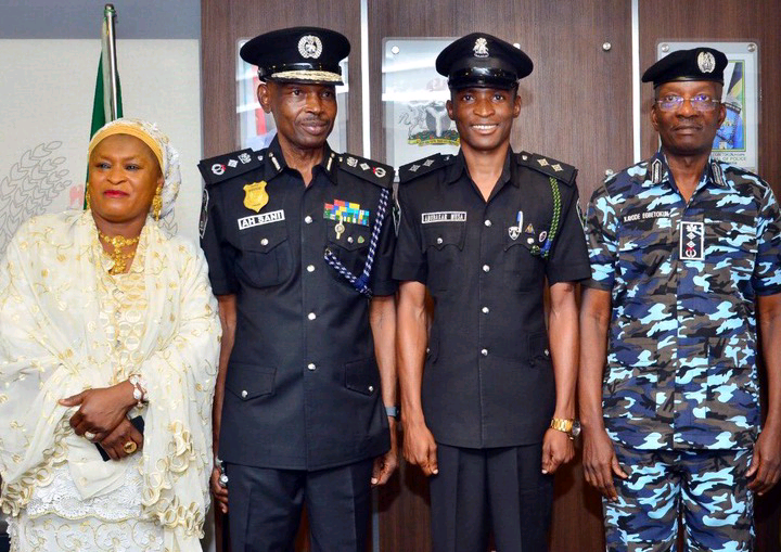 Father, son decorated same day with new Police ranks